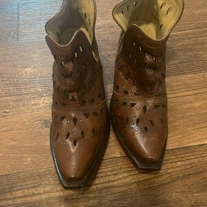 Ariat booties worn once to a concert. Studs with cutouts.